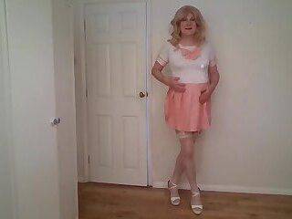 Blonde shemale in pink and white outfit - ashemaletube.com